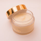 Cleansing balm jar with pale cream balm and gold open lid