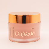 OmVeda Clove Purifying Mask jar front view, gold lid and pale pink body, 50 ml