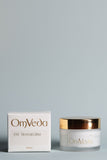 OmVeda Eye Transform skincare cream jar with gold lid and product box, 50ml