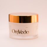 OmVeda luminous moisturiser jar front view with gold lid; 50 ml