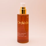 OmVeda Natal Nurture massage oil 100ml amber bottle with gold pump