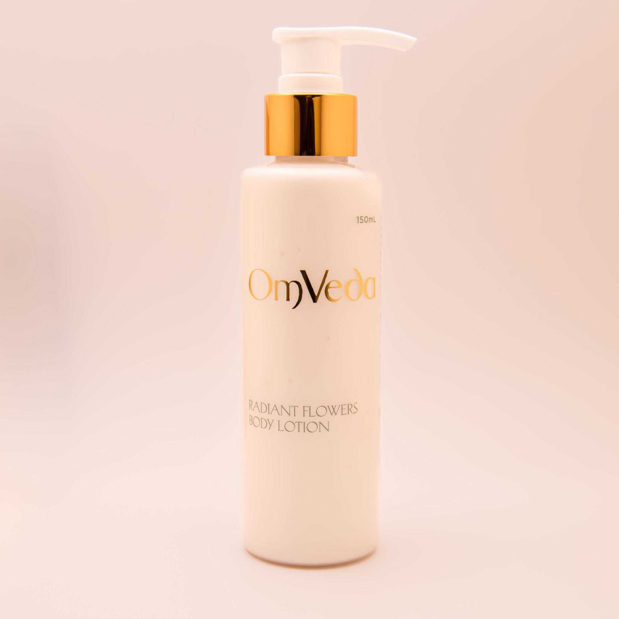 OmVeda Radiant Flowers body lotion bottle with pump, gold cap, 150 ml