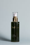 Recovery body oil bottle with gold pump, dark green glass, clear top, 100ml