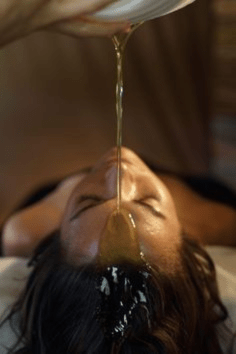 What Is Shirodhara? Understanding Ayurveda's Most Iconic Oil Therapy - OmAyur Wellness