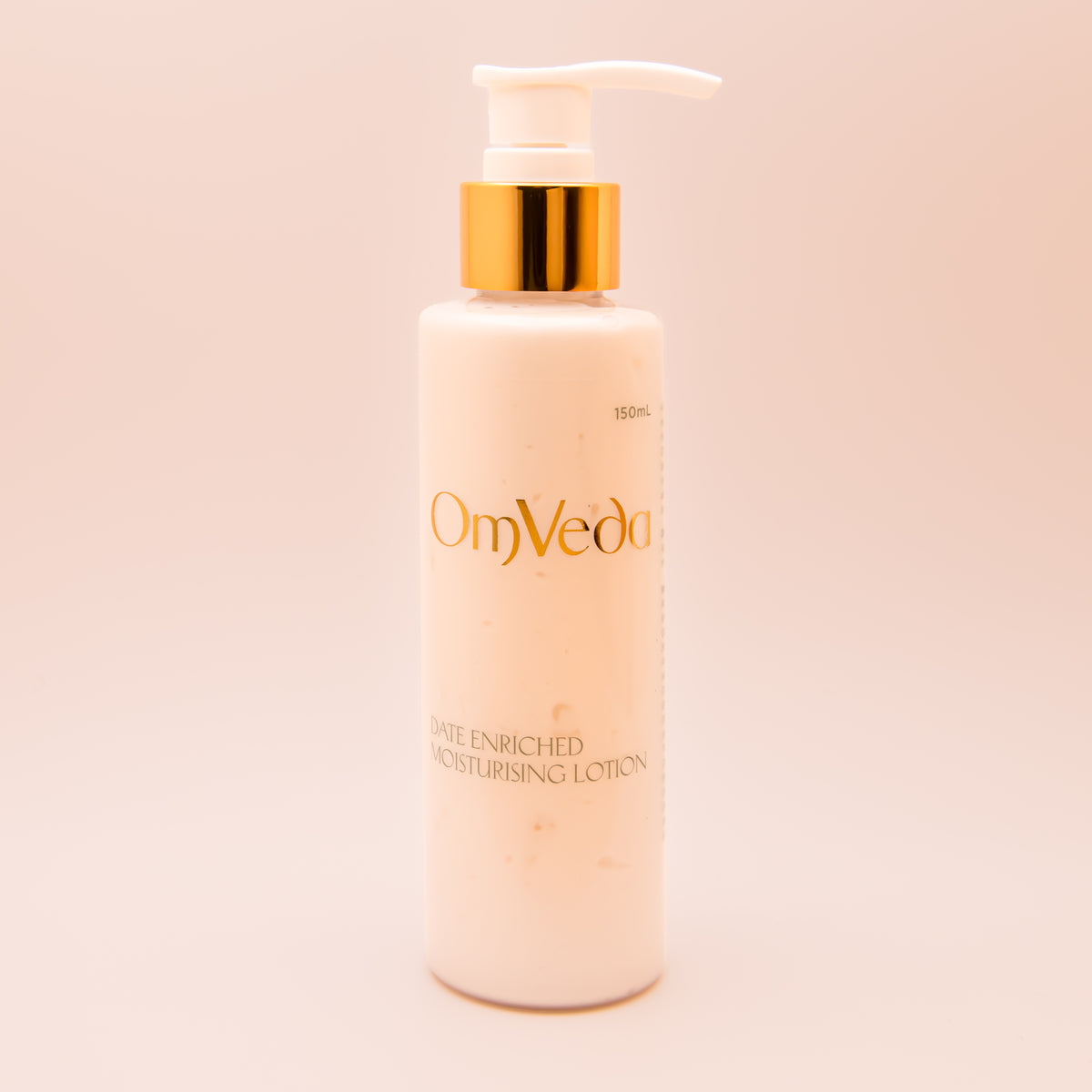 OmVeda date-enriched moisturizing lotion bottle with gold pump, 150 ml