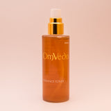 OmVeda Radiance Toner 100ml amber toner bottle with gold cap